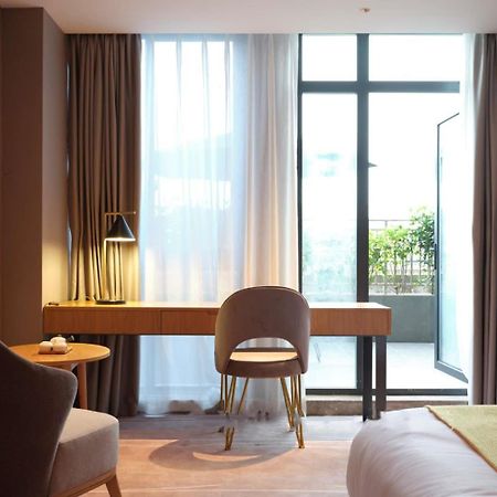 Baian Art Hotel Luzhou Extérieur photo